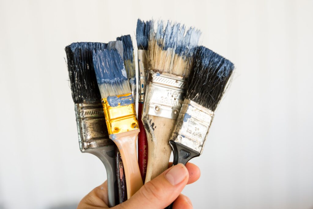 Image of messy paintbrushes that need to be cleaned